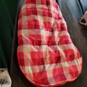 Dog jacket 20 inches long adjustable velcro for size. Sized for small to medium